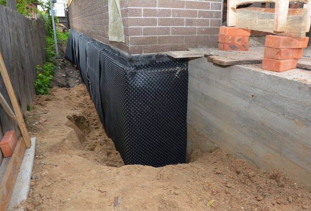 SJ Waterproofing Pros technician performing targeted Vapor Barrier Installation assessment in Senoia, GA